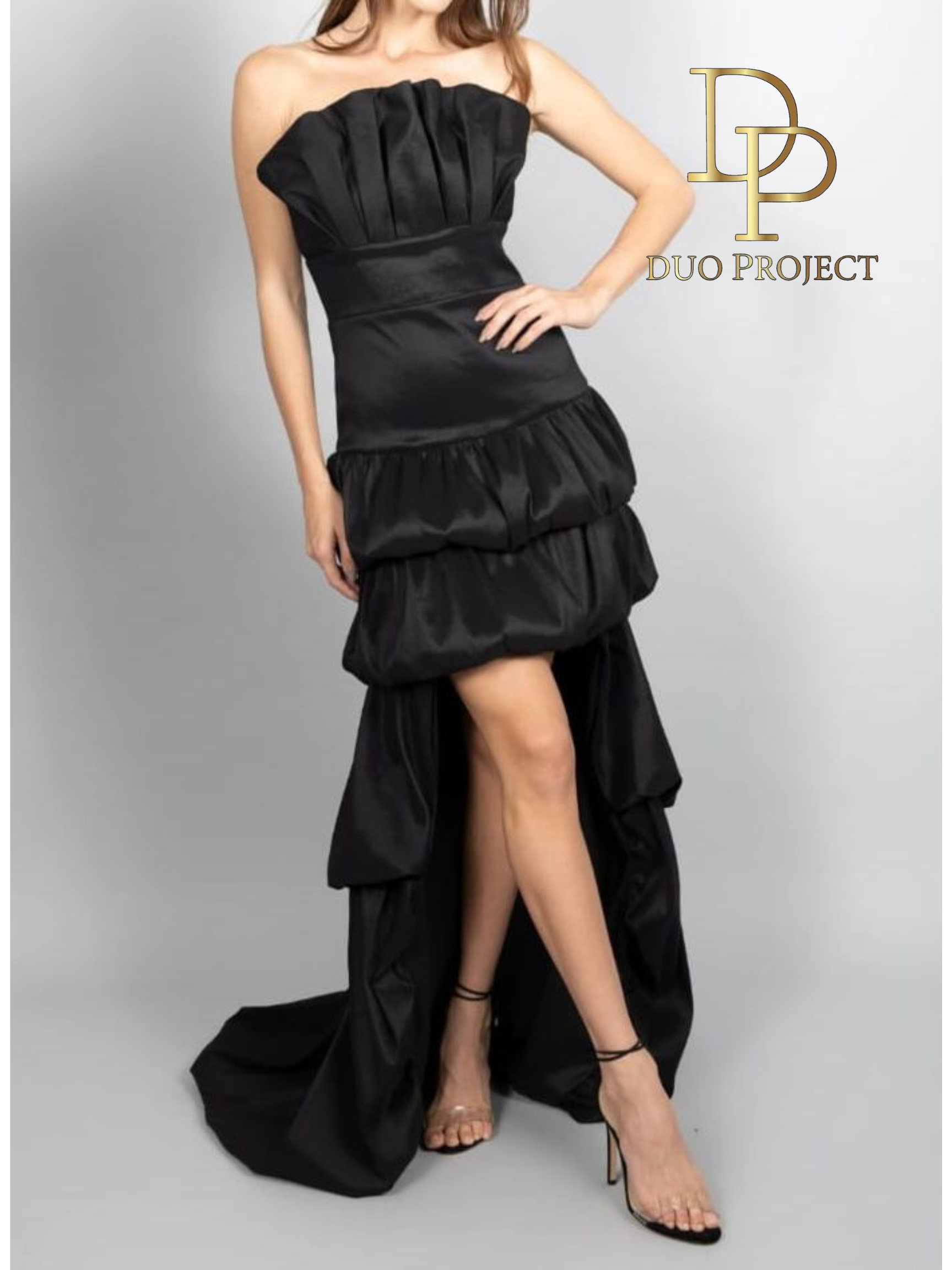 Strapless high low ruffle layered taffeta gown