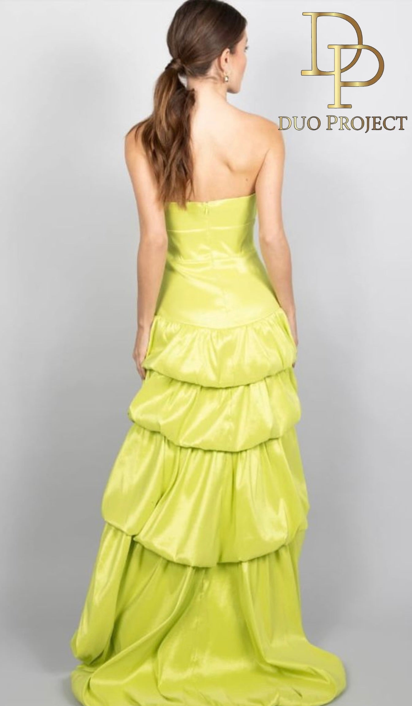 Strapless high low ruffle layered taffeta gown