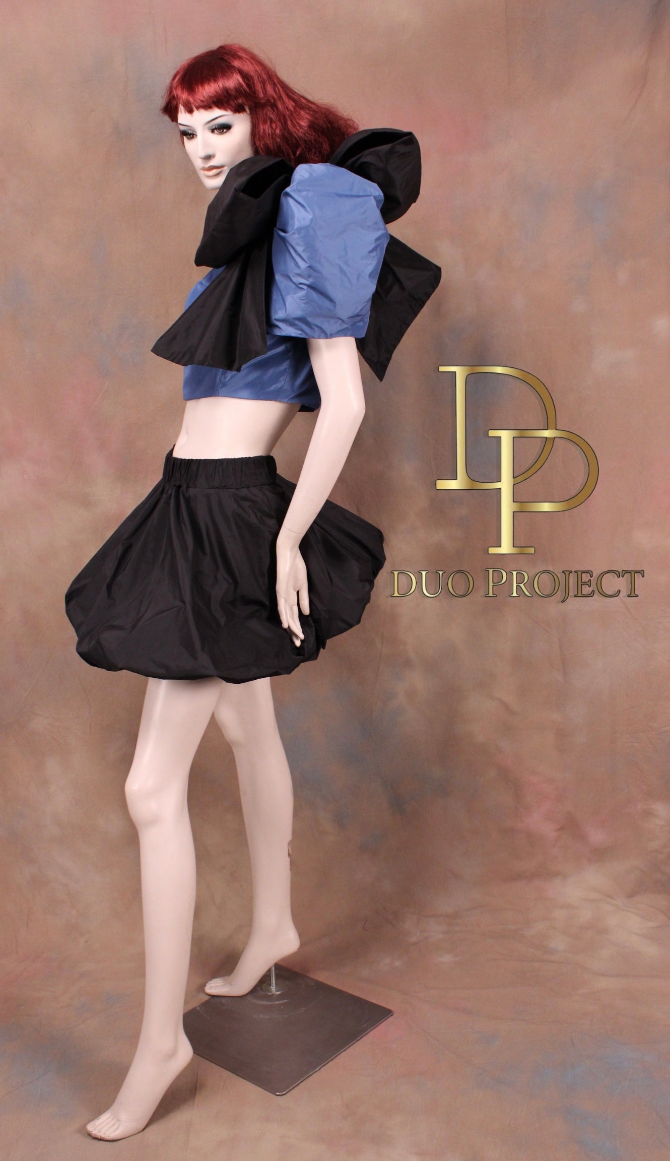 Dulce Bubble Skirt And One Shoulder Puffy Sleeves Top